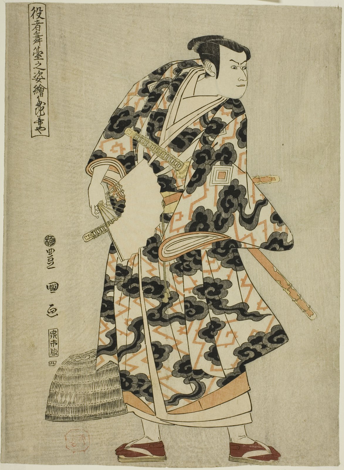 歌川豊国の大判役者絵。市川八百蔵が不破伴左衛門に扮し、稲妻文様の着物姿で刀を身につけ、片手に扇を持って見得を切る全身像