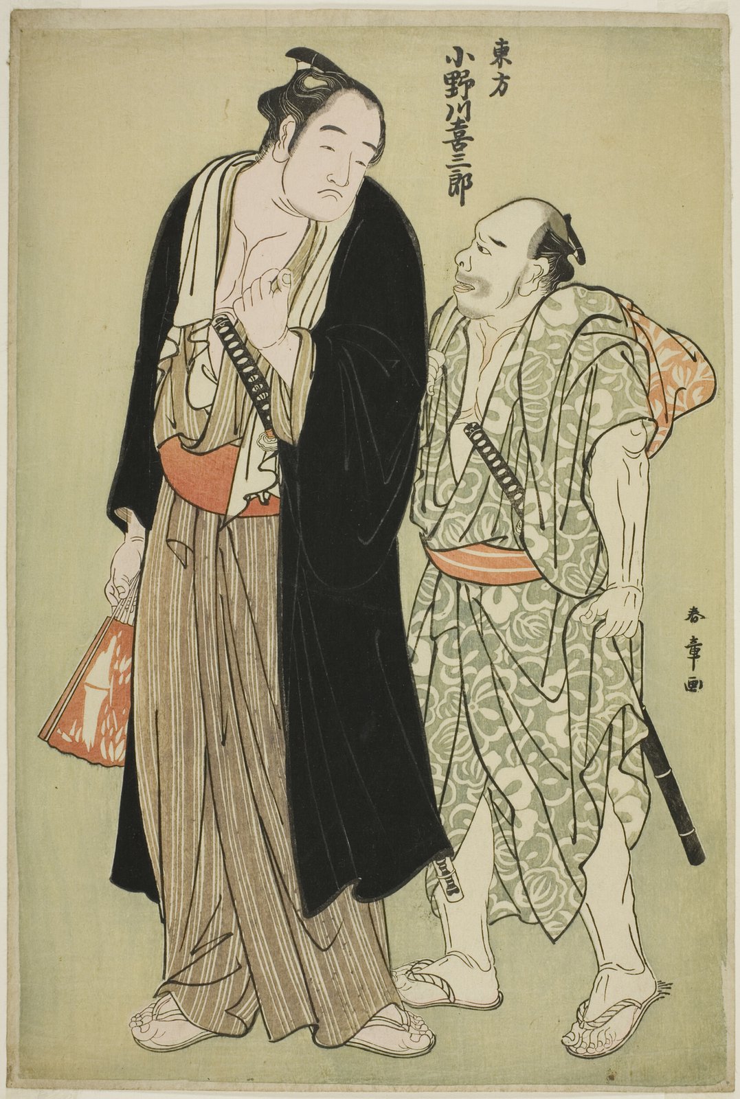 勝川春章による相撲の錦絵。東方の力士小野川喜三郎と脇に控える人物を描いた一図で、絵柄の四方に紙の余白が途切れずぐるりと残っている