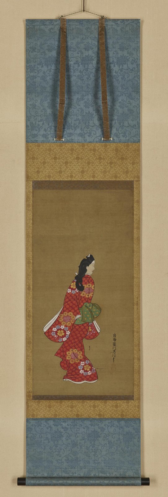 菱川師宣「見返り美人図」。振り返る女性を描いた肉筆の掛軸。赤地に花柄の着物を着て、後ろを振り向いている